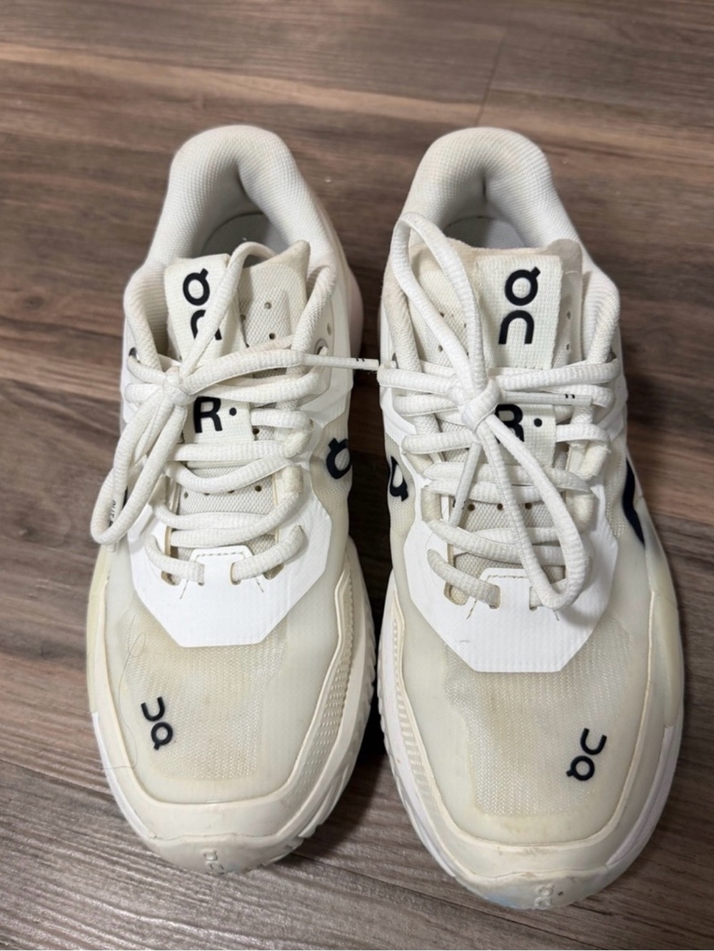 On Running White Sneakers with Black Logo